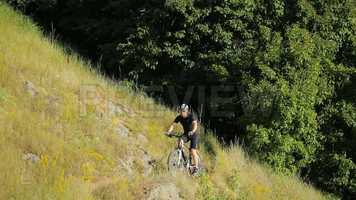 Free download Cycling On A Hill Stock Video video and edit with RedcoolMedia movie maker MovieStudio video editor online and AudioStudio audio editor onlin